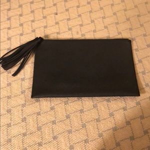 Brand new black Parker clutch with fringe tassel